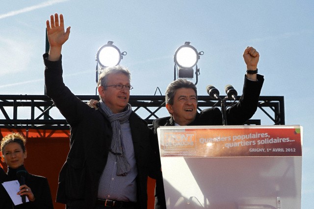 1 avril 2012, la France --- Jean-Luc Mélenchon et Pierre Laurent, chef du parti communiste français, arrivent pour assister à un rassemblement politique à Grigny, près de Paris, le 1er Avril 2012. --- Image par © GONZALO FUENTES / Reuters / Corbis