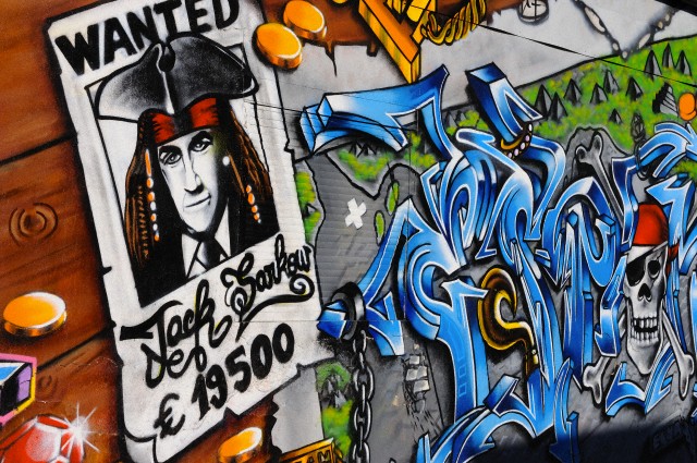 Avril 2011, Paris, France --- murale illustration Nicolas Sarkozy comme le pirate Jack Sparrow, à Montreuil, près de Paris. --- Image par © Frédéric Soltan / Corbis